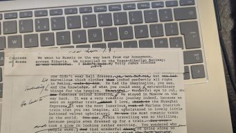 Anne's recollections of her honeymoon in 1936 Typewritten legal document page with handwritten signatures and a laptop keyboard background